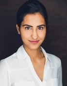 Amrit Kaur as Bela Malhotra